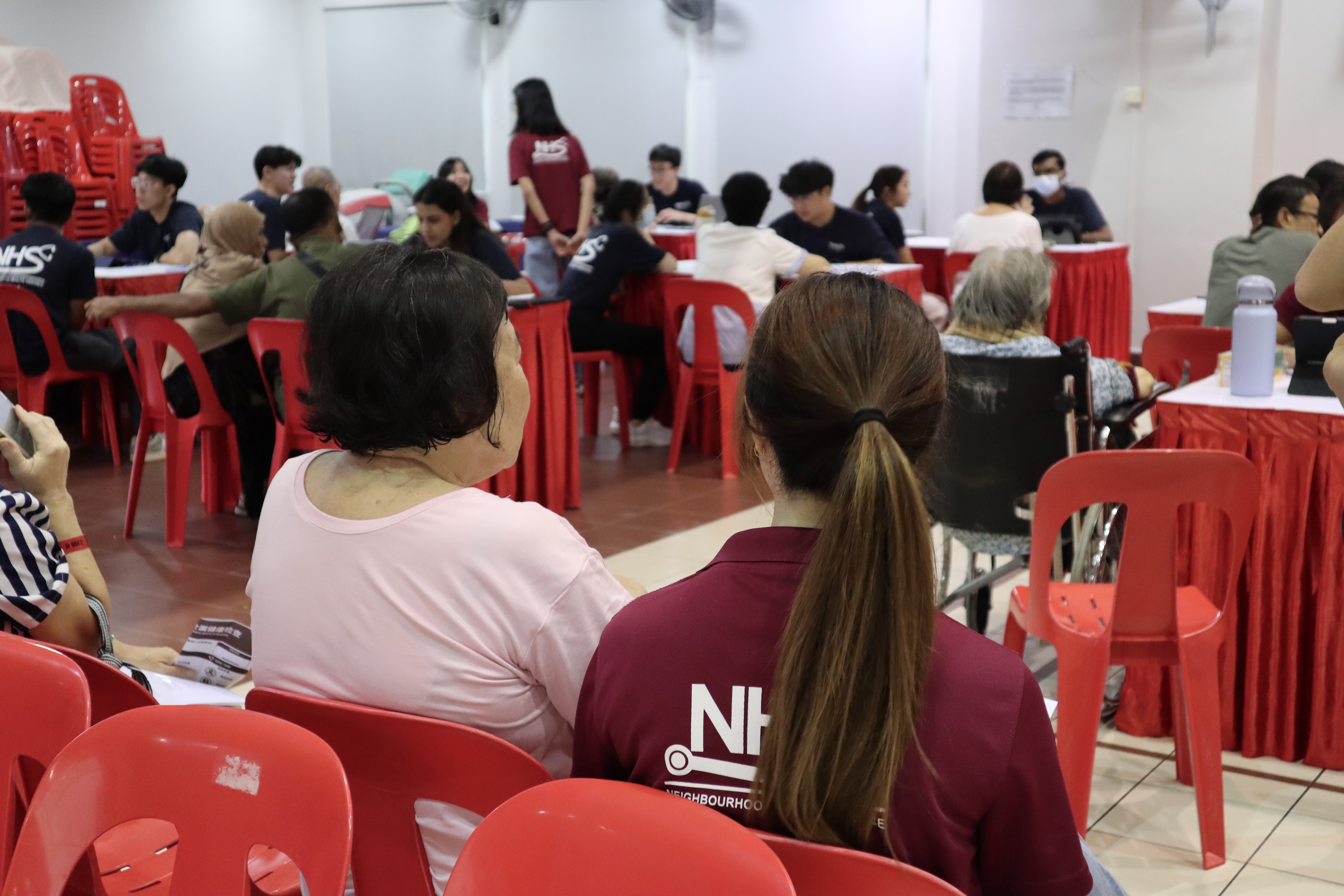Screening event hall, residents and volunteers
